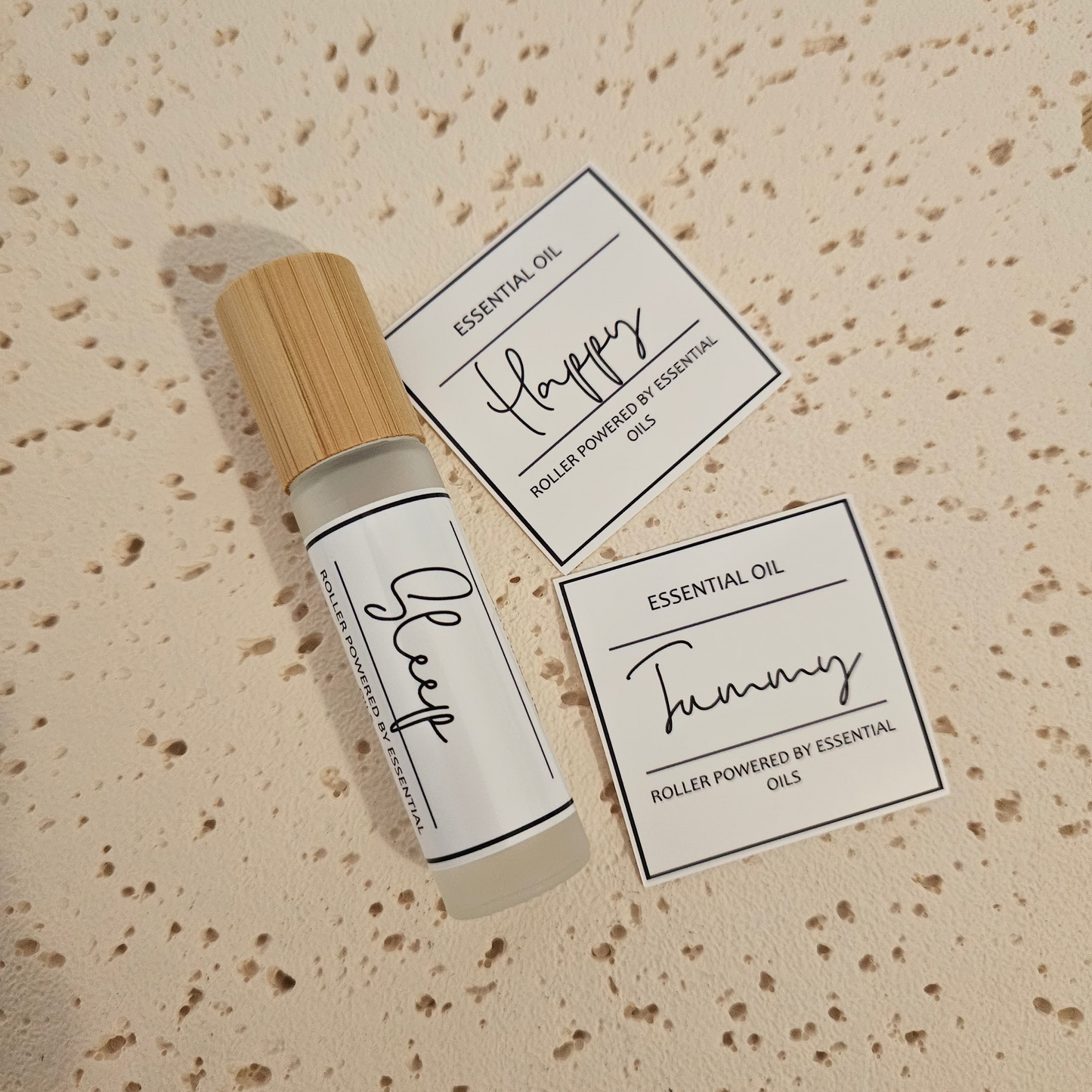 Essential oil roller bottles with Script writing essential oil label