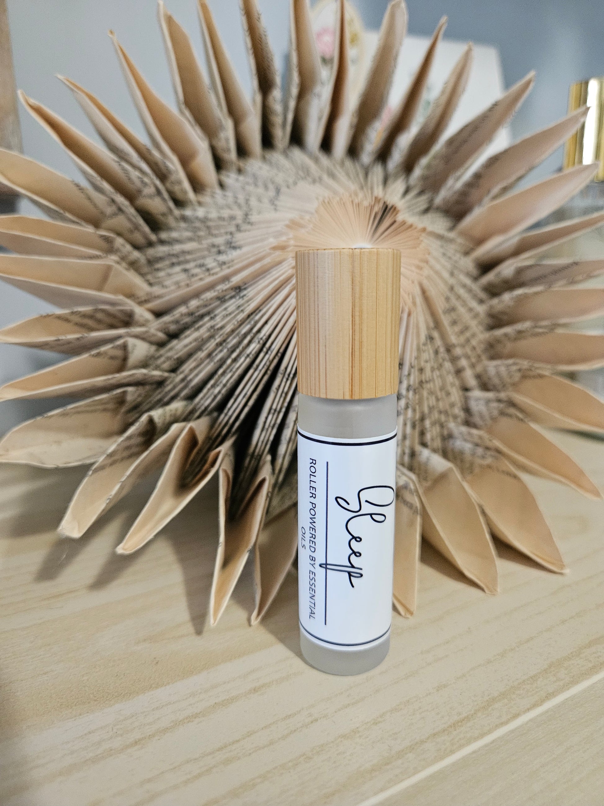 10ml roller bottle with wooden cap . Script writing essential oil label